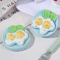 Macro detail of miniature resin fried egg with lettuce on blue plate for dollhouse DIY - Blue Plate Fried Egg