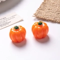 Détail de 2 perles citrouilles orange vif pour bijoux DIY avec tiges vertes - Style A / Orange Citrouille