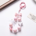 Pink and white beaded keychain with heart charms and bow for phones and bags - Pink