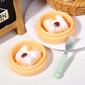 Miniature dim sum toy set with two orange steam baskets and a green fork for DIY crafts - Mini Steamed Buns