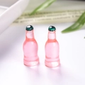 Set van twee miniatuur roze frisdrankflesjes van hars voor poppenhuis en DIY knutselen - Roze