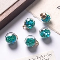 Crystal glass ball pendant with green heart sequins and golden metal hanging loop - Malachite green