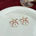 Fashionable baseball bow earrings with red stripes and gold edges on a white plate - Bowknot Style