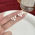 Creative baseball stitch heart earrings with long red tassels and golden enamel edges - Heart Baseball Style