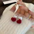 Red flocked heart and pearl drop earrings for women styled with a cozy winter sweater - Red