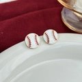 Pair of baseball-shaped stud earrings with red stitching and elegant gold metal trim - Gold Edged Baseball Style