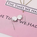 Minimalist silver round disk drop earrings with hooks shown in a high-quality close-up - Hook Dangle Earrings / Silver