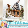 Abziehbarer Fensteraufkleber mit Comic-Hase auf Schneezaun für Glasdekoration - Warme Winterflüstern (Statisch Haftend) / Mittel