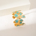 Anello a fiore regolabile con petali in smalto turchese e finitura in oro lucido - Petalo Argento Oro (S1009)