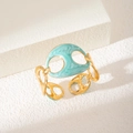 Bracciale rigido regolabile in acciaio dorato con maglia smaltata verde menta - Cuore Rosa (S1003)