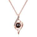 Rose gold projection necklace with flame design and I Love You in 100 languages - Abstract Curve Rose Gold