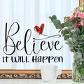 Dettaglio dell'adesivo murale Believe IT WILL HAPPEN con cuore rosso su vetro - Stile Believe IT WILL HAPPEN (AM22002)