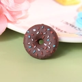 Macro shot of realistic chocolate resin donut with colorful sprinkles and fine texture - Extra Large / Brown