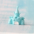 Macro shot of light blue resin castle miniature for DIY crafts and micro landscape decor - Castle Blue