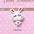 Macro shot of 1.9x2.8cm cartoon white rabbit resin charms for DIY hair accessories - Heart Rabbit-White