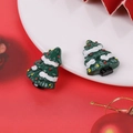 Macro detail of resin Christmas tree ornaments with snow finish for DIY crafts - Snowy Christmas Tree