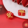 Macro detail of red and gold Christmas gift box resin earring with glitter accents - Glitter Gift Box - Red