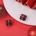 Close-up of mini resin Christmas gift box charms for DIY phone case craft and holiday decor - Gift Box Cake