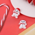 Detail of Christmas resin snowmen with red hats and scarves for DIY holiday craft projects - Snowman with Red Hat and Scarf