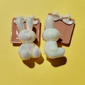 Detailed macro view of pearlescent rabbit charms with white bows for DIY jewelry - 3mm Hole / White