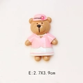 Detail view of cartoon resin bear accessory in pink outfit measuring 2.7x3.9cm - Pink Hat Pink Clothes
