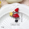 Détail de la figurine de Noël en résine pailletée mesurant 3,6 cm sur 2,7 cm - Gnome Argenté Avec Étoile