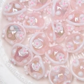 Macro shot of pink iridescent beads with 3D white floral patterns for DIY jewelry making - 18mm / Light Pink Bead + White Flower