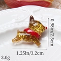 Macro detail of a 3.2cm clear resin bulldog figurine with gold glitter and red collar - Gold Deer Facing Right
