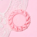 Macro shot of pink silicone jewelry mold featuring intricate vintage floral relief patterns - Light Pink
