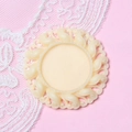 Macro shot of 2.5cm cream white resin vintage embossed round cameo bezel frame for DIY - Off White