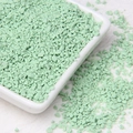 Detail view of light green irregular stone granules in a minimalist white square ceramic dish - 10g Per Pack / Matcha Green