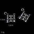 Detail view of retro silver telescope alloy pendants for DIY jewelry making - Telescope