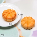 Λήψη macro από μενταγιόν κολοκύθας ρητίνης 2cm με διαστάσεις και λεπτομέρειες βάρους - Γεωμετρικό Μπισκότο Συναρμολόγησης