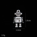 Detail shot of mini vintage silver robot pendant with dimensions 1.8cm by 1.2cm - Robot