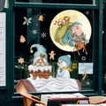 Christmas window decals featuring Santa, snowman and snowflakes for festive glass decoration - SD2208