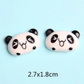 Macro view of cute 2.7x1.8cm panda resin charms for DIY hair accessories and phone cases - Happy Expression