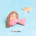 Macro detail of a 25x30mm pink resin mermaid charm for DIY hair clips and slime crafts - Brown Hair Pink Tail Sitting (D)