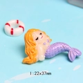 Detailed macro view of 22x37mm resin mermaid miniature with purple tail for DIY crafts - Yellow Hair Purple Tail (I)