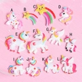 Gedetailleerd raster met 12 glitterhars eenhoorn- en vallende ster charms voor DIY-projecten - Gemengde Kleuren