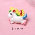 Close-up of a colorful resin unicorn charm for DIY crafts measuring 2.5x3cm - 2.5x3cm / Standing Yellow Mane Unicorn (E)