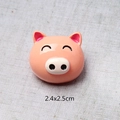 Macro view of 2.4x2.5cm pink resin cartoon pig charm for DIY crafts and phone case - Mini Pig Head