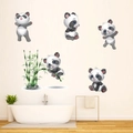 Detail view of cute panda and green bamboo wall decals applied on a clean bathroom wall - Cute Panda Style (KSY145)