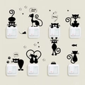 Detail view of eight black PVC cartoon cat silhouettes for light switch wall decoration - Black 9 Action Cats (ZY288)