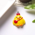 Detailed close-up of a resin cartoon chicken pendant with a red heart and silver ring - With Eye Screw / Chick with Backpack