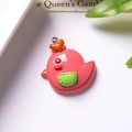 Close-up of a pink resin cartoon bird charm with heart detail for DIY keychains - With Eye Screw / Red Chick With Green Pocket