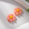 Detalle macro de flores de margarita de resina rosa de 12 mm para joyas DIY y fundas móvil - Rosa Melocotón