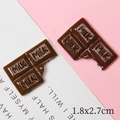 Dettaglio charm in resina cioccolato con rilievo MILK ed effetto morso per il fai da te - 1.8x2.7cm / Caffè (Grande)