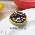 Macro view of 2.4cm resin chocolate donut charm with white stripes and colorful sprinkles - Line Coffee