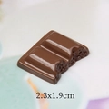 Macro detail of realistic 3D resin chocolate charm with bite mark for DIY crafts 2.3x1.9cm - Coffee Bitten Style / 2.3x1.9cm