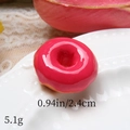 Macro shot of 0.94-inch pink resin donut pendant with dimensions on a white plate - Rose Red